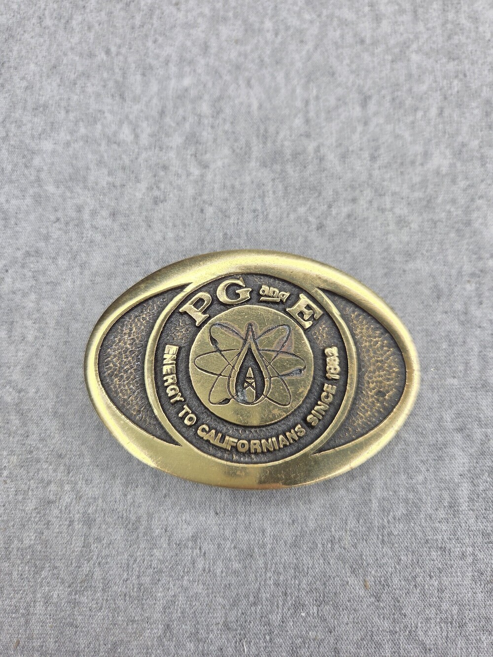 PGE Belt Buckle Vintage 1978 Solid Brass Atomic Energy Nuclear Power BTS Oval